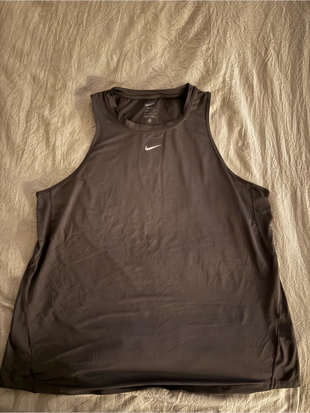 Nike Men’s Black Sleeveless Workout Tank with White Swoosh